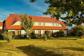strandnahe Ferienwohnung mit eigener Terrasse - Feriendorf Bakenberg FeWo D06, Dranske